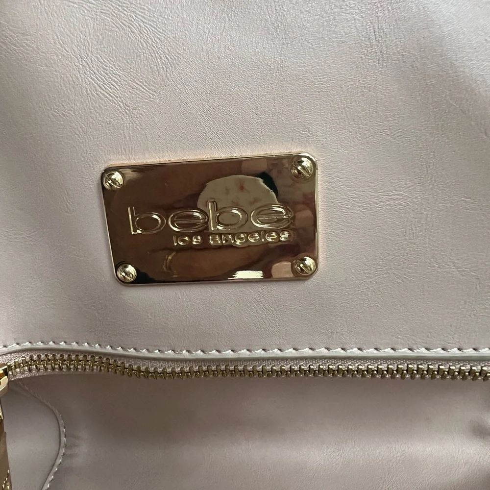 Bebe Blush Pink Backpack. Vegan leather. Lots of pockets.